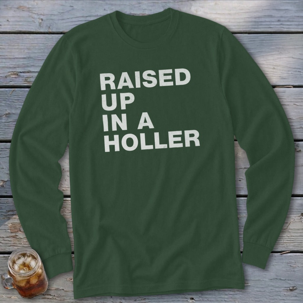 Long sleeve t-shirt with white text "RAISED UP IN A HOLLER".