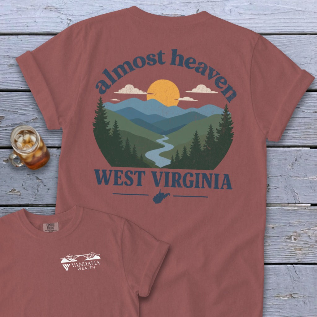 Rust colored t-shirt with "Almost Heaven West Virginia" and a mountain landscape graphic.