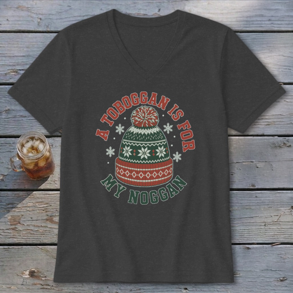 Dark gray V-neck t-shirt featuring a graphic of a winter hat and the text A Toboggan Is For My Noggan.