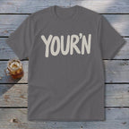 Gray t-shirt with "YOUR'N" printed in off-white text.