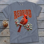 A slate-gray t-shirt featuring a graphic of a red cardinal perched on a snowy branch with the text "REDBIRD".