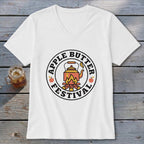 White t-shirt with a circular Apple Butter Festival logo featuring a steaming kettle over a campfire.