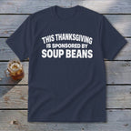 A dark blue t-shirt with white text that reads This Thanksgiving Is Sponsored By Soup Beans.