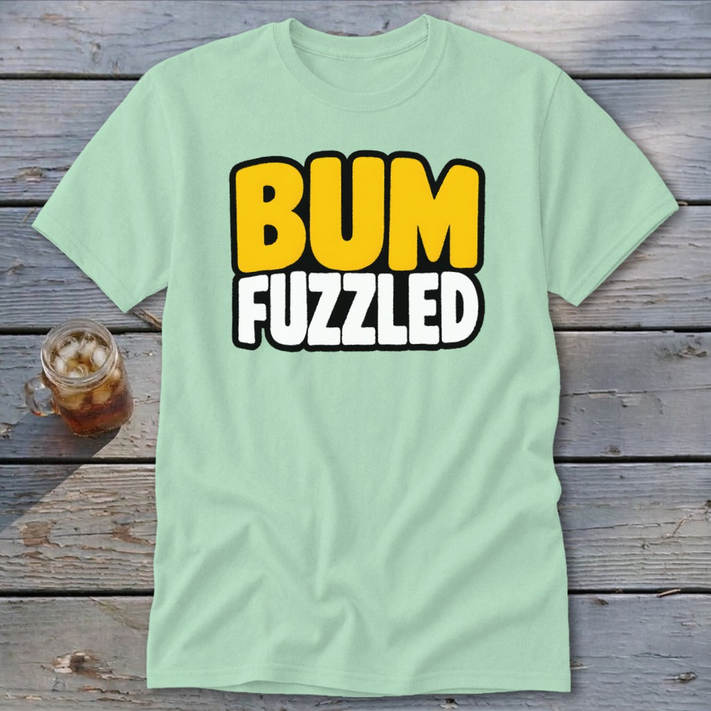 Light green short-sleeve t-shirt with black-outlined yellow and white text reading BUM FUZZLED across the chest.