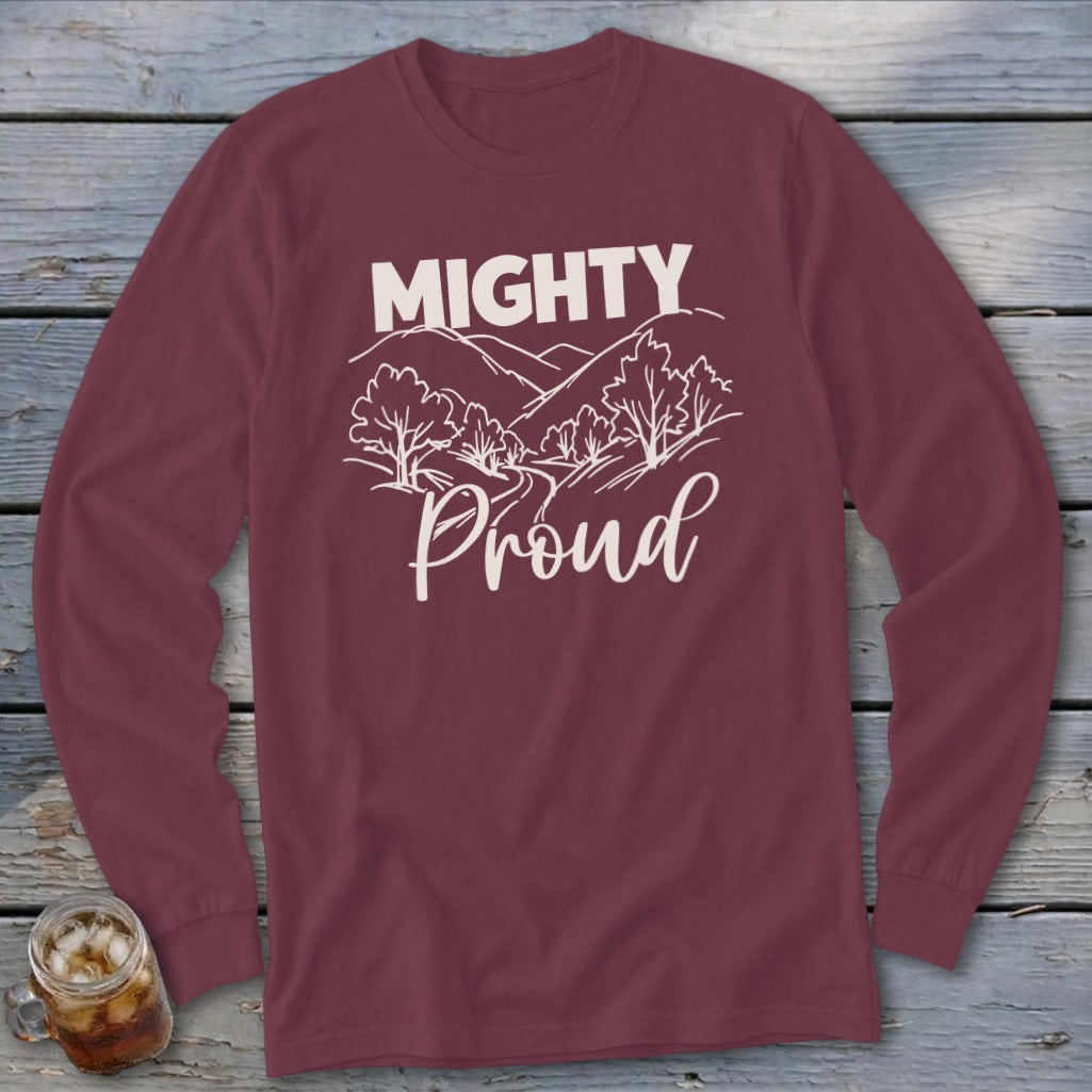 Maroon long-sleeve shirt with "Mighty Proud" text and a sketched landscape design.