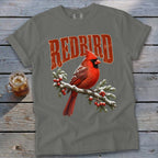 Grey t-shirt featuring a graphic of a red cardinal on a snowy branch with the text REDBIRD.