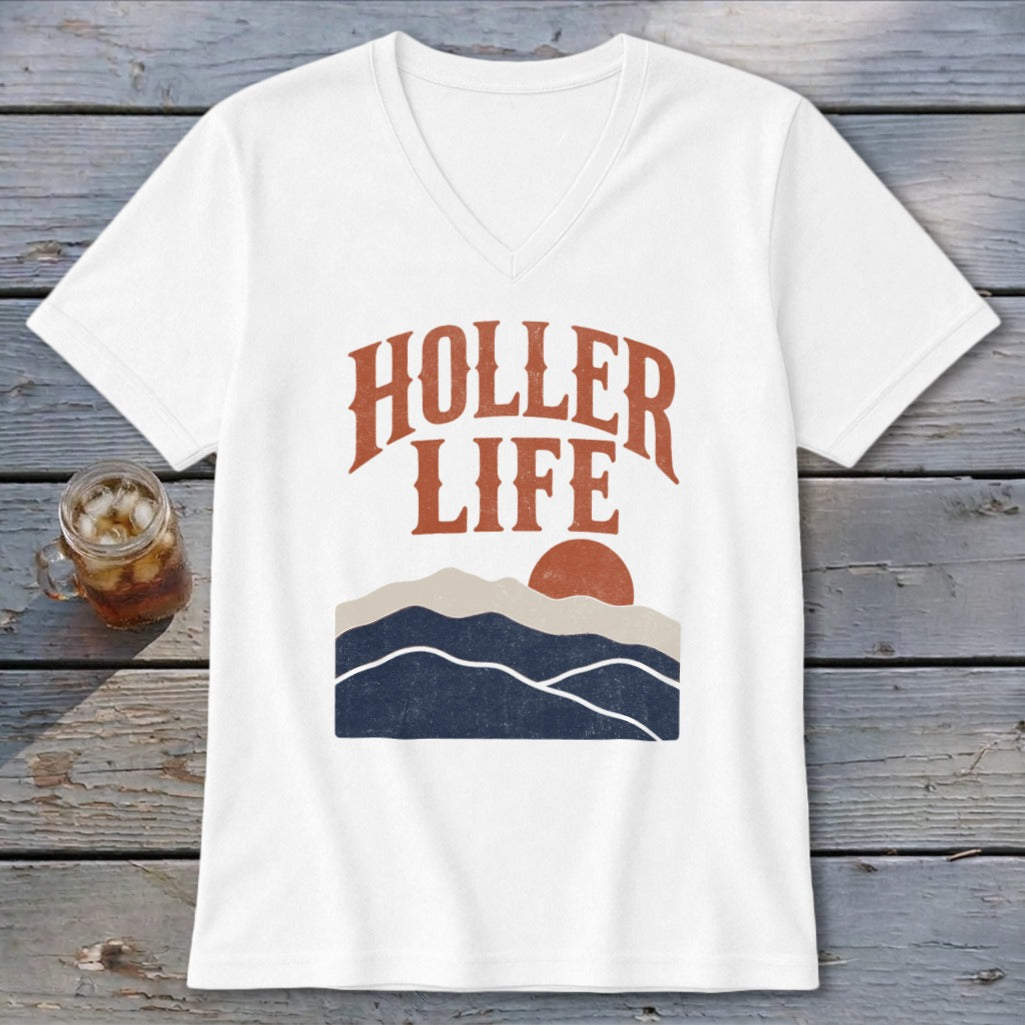 A white V-neck t-shirt featuring a retro graphic with the text HOLLER LIFE above mountain layers and a sun.
