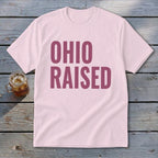 Light pink t-shirt with "OHIO RAISED" text in maroon.