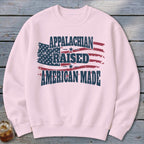 Light pink sweatshirt with "Appalachian Raised American Made" text over an American flag graphic.