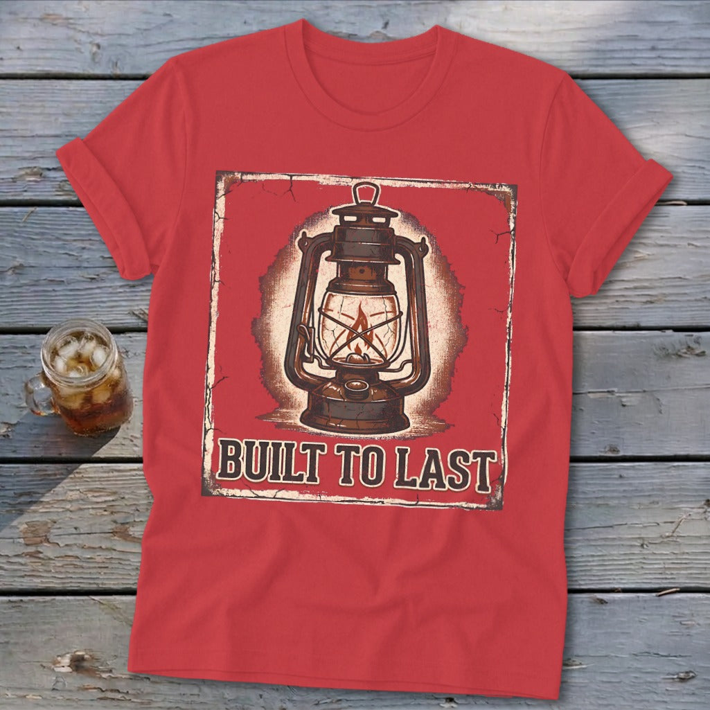Red t-shirt with a vintage lantern graphic and text "BUILT TO LAST".