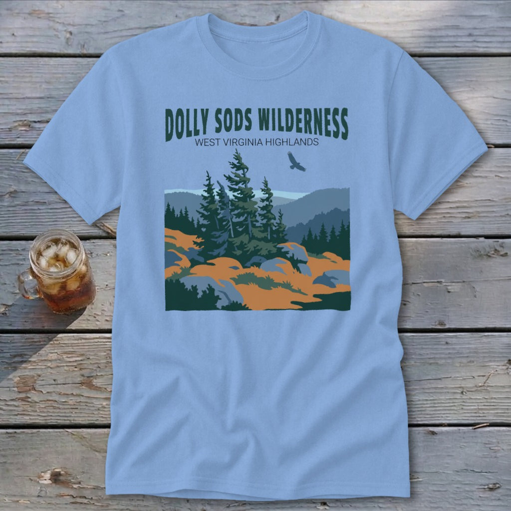 Light blue t-shirt featuring a green graphic of Dolly Sods Wilderness with pine trees and mountains.