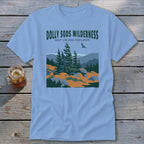 Light blue t-shirt featuring a green graphic of Dolly Sods Wilderness with pine trees and mountains.