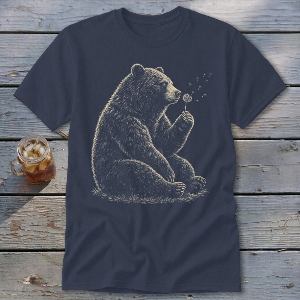 Bear sitting and blowing on a dandelion on a navy t-shirt.