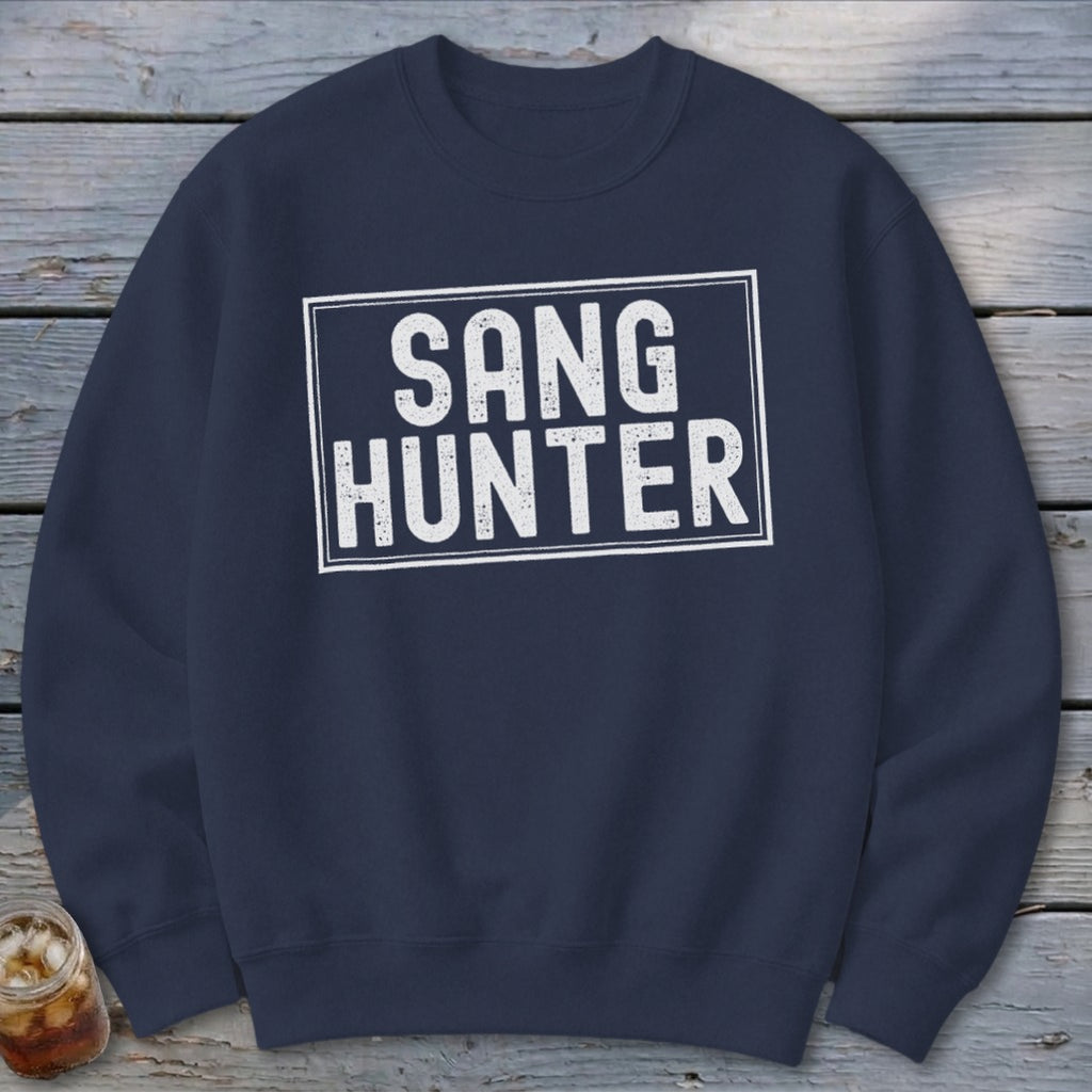 Navy sweatshirt with "SANG HUNTER" text in a white rectangular box.