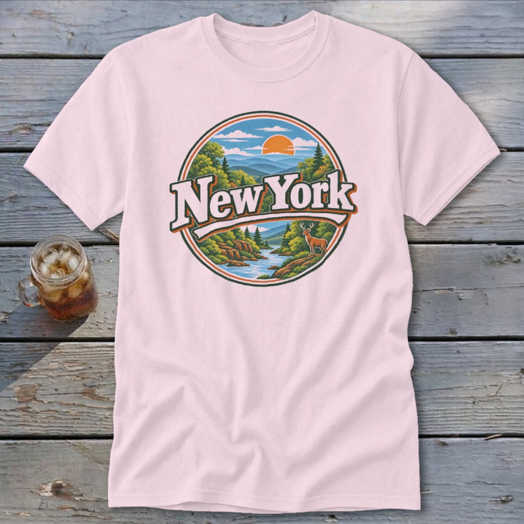 Pink t-shirt with "New York" graphic featuring mountains, river, trees, and deer.