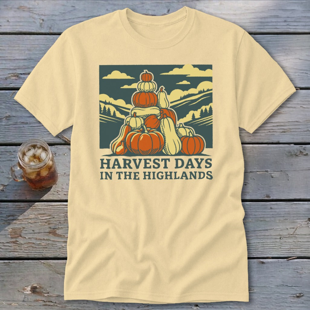 Light yellow t-shirt featuring a stack of pumpkins and the text "Harvest Days in the Highlands."