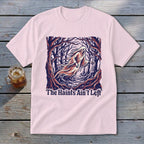 Pink t-shirt with a ghost in a spooky forest and text "The Haints Ain't Left".