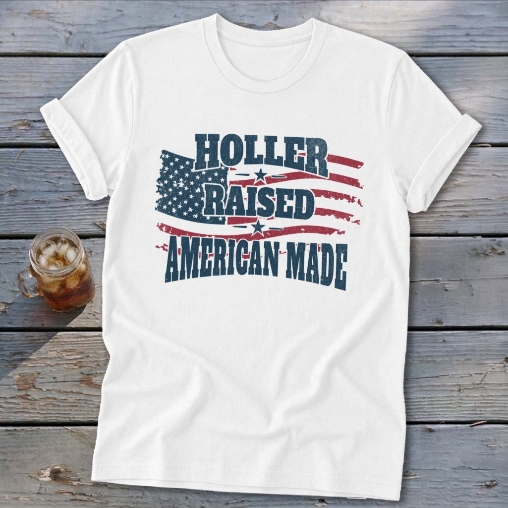 White t-shirt with American flag graphic and text: Holler Raised American Made.