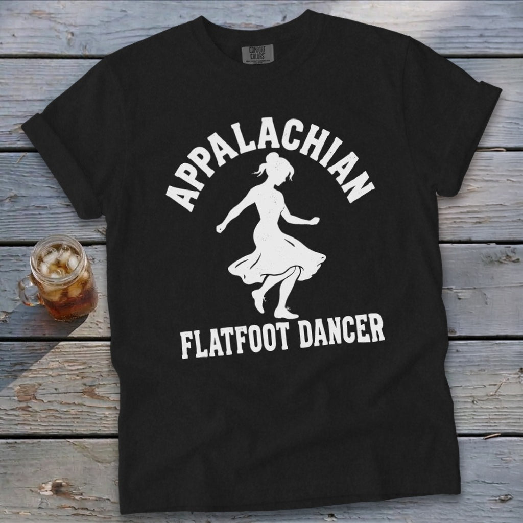 A black t-shirt featuring white text that reads Appalachian Flatfoot Dancer around a dancing figure.