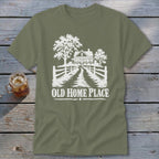 T-shirt graphic with white illustration of a house and trees with the text "OLD HOME PLACE."
