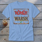 Light blue t-shirt featuring a rusty square graphic with the crossed-out word WASH above the checked word WARSH.