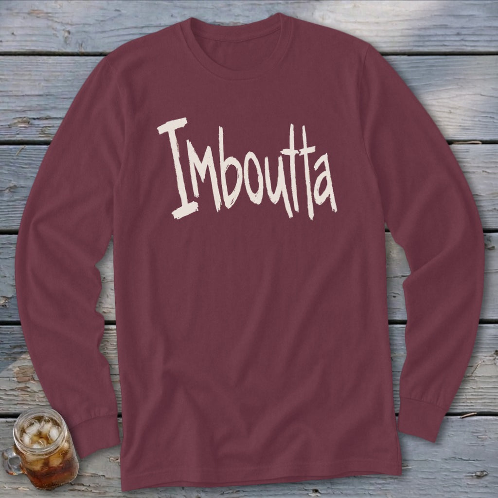 Maroon long-sleeve t-shirt with "Imboutta" text in a cream, handwritten font.