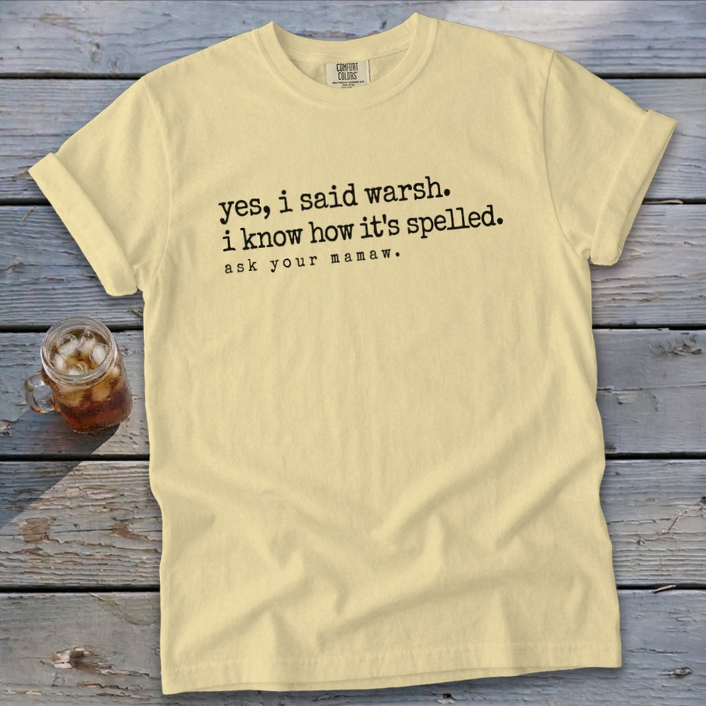 Yellow t-shirt with black text: "yes, i said warsh. i know how it's spelled. ask your mamaw."