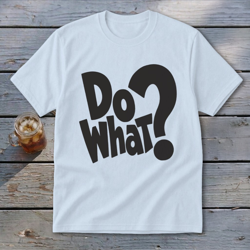 A white short-sleeve t-shirt with black text that reads "Do What?" lies on a weathered wooden surface next to a glass of iced tea.