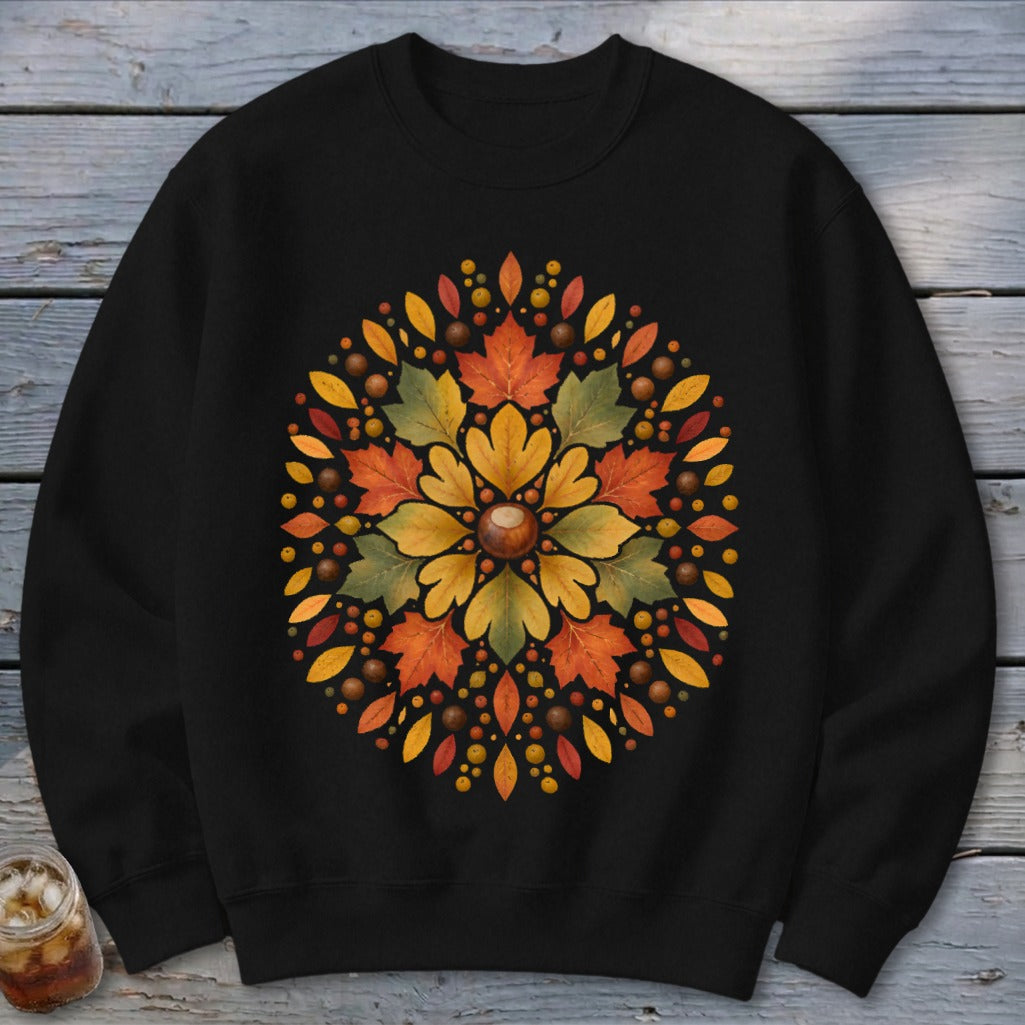 Black sweatshirt with circular autumn leaf and acorn design.