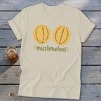 Light beige t-shirt with "mushmelons" text and two illustrated melons.