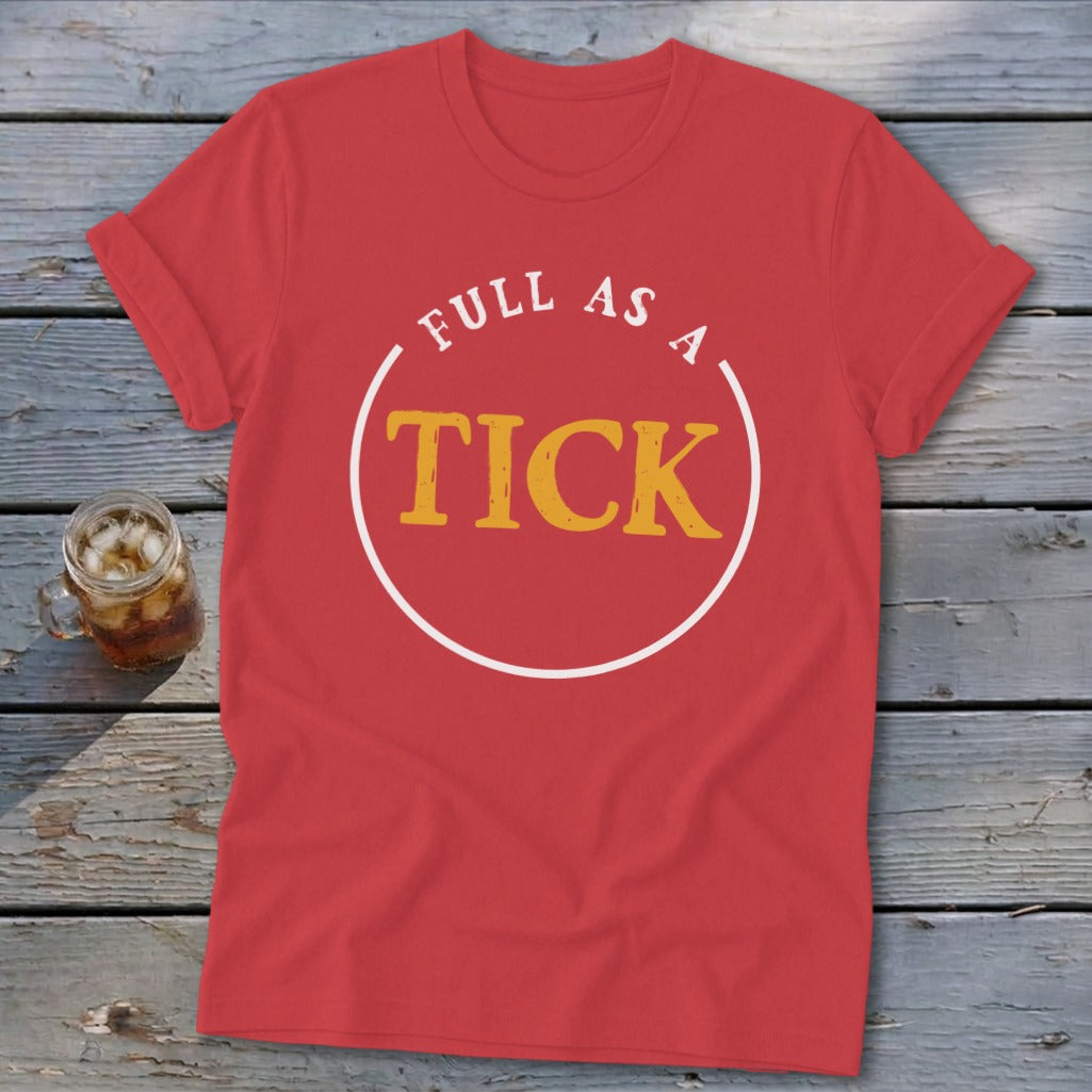 Red t-shirt with white circle containing yellow text "FULL AS A TICK".