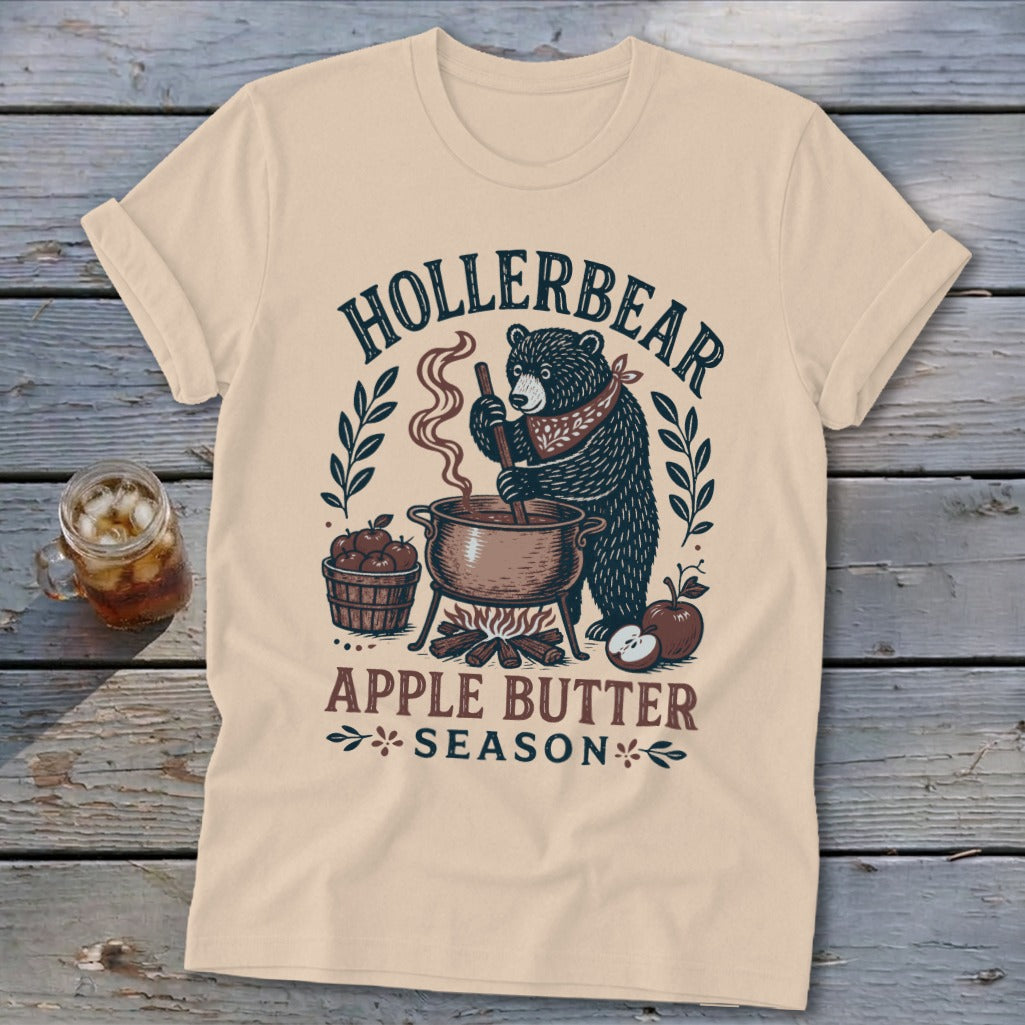 Bear making apple butter with text "Hollerbear Apple Butter Season."