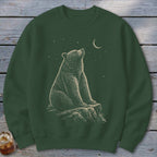Green sweatshirt with a stylized illustration of a bear sitting on a rock under a starry night sky.