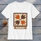 White t-shirt with a square quilt block design and "TURKEY TRACK" text.