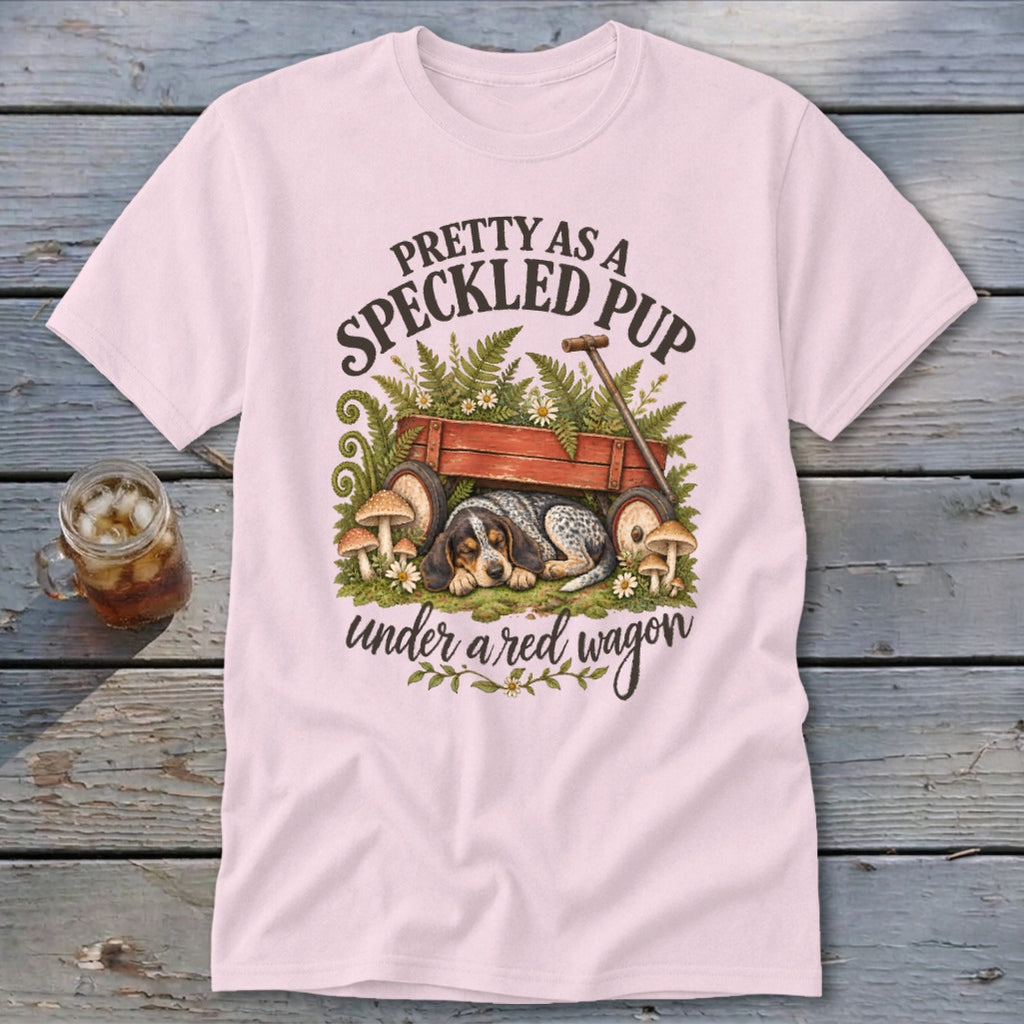 Pink t-shirt with "Pretty as a Speckled Pup under a red wagon" text and illustration.