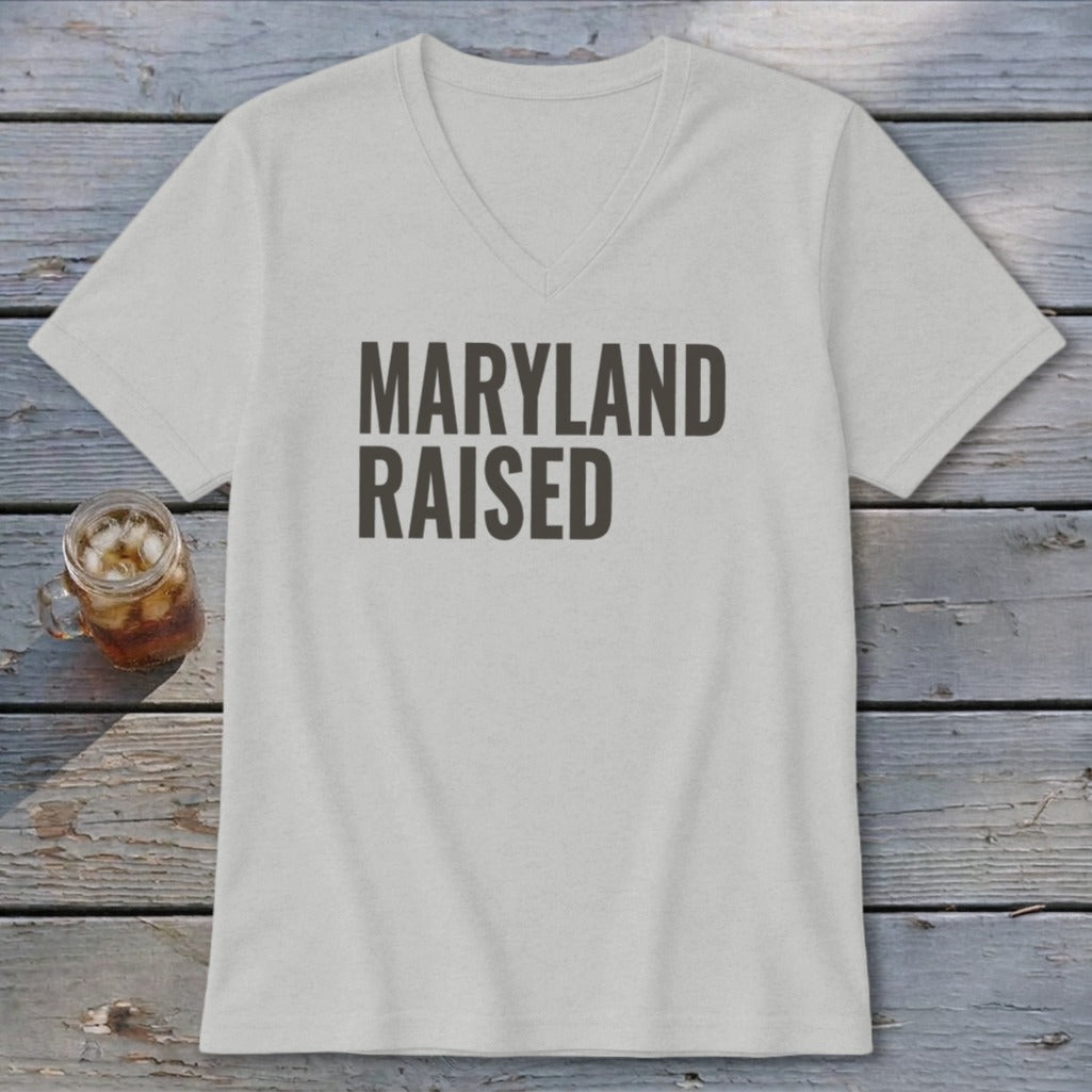 Light gray v-neck t-shirt with "Maryland Raised" text.