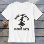 A white V-neck t-shirt featuring a black silhouette of a female dancer and the text Appalachian Flatfoot Dancer.