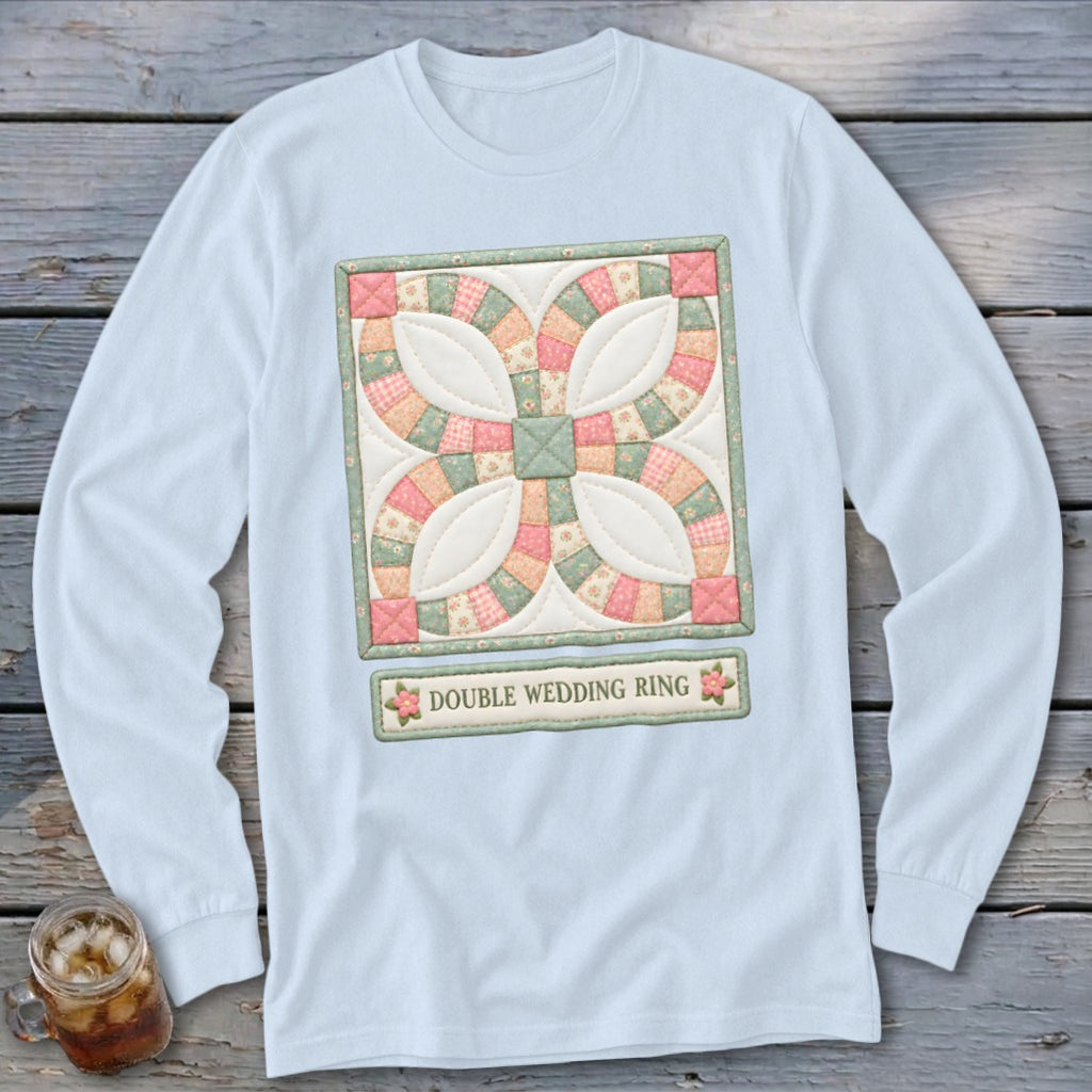 Light blue long-sleeve shirt with a Double Wedding Ring quilt block design and text.