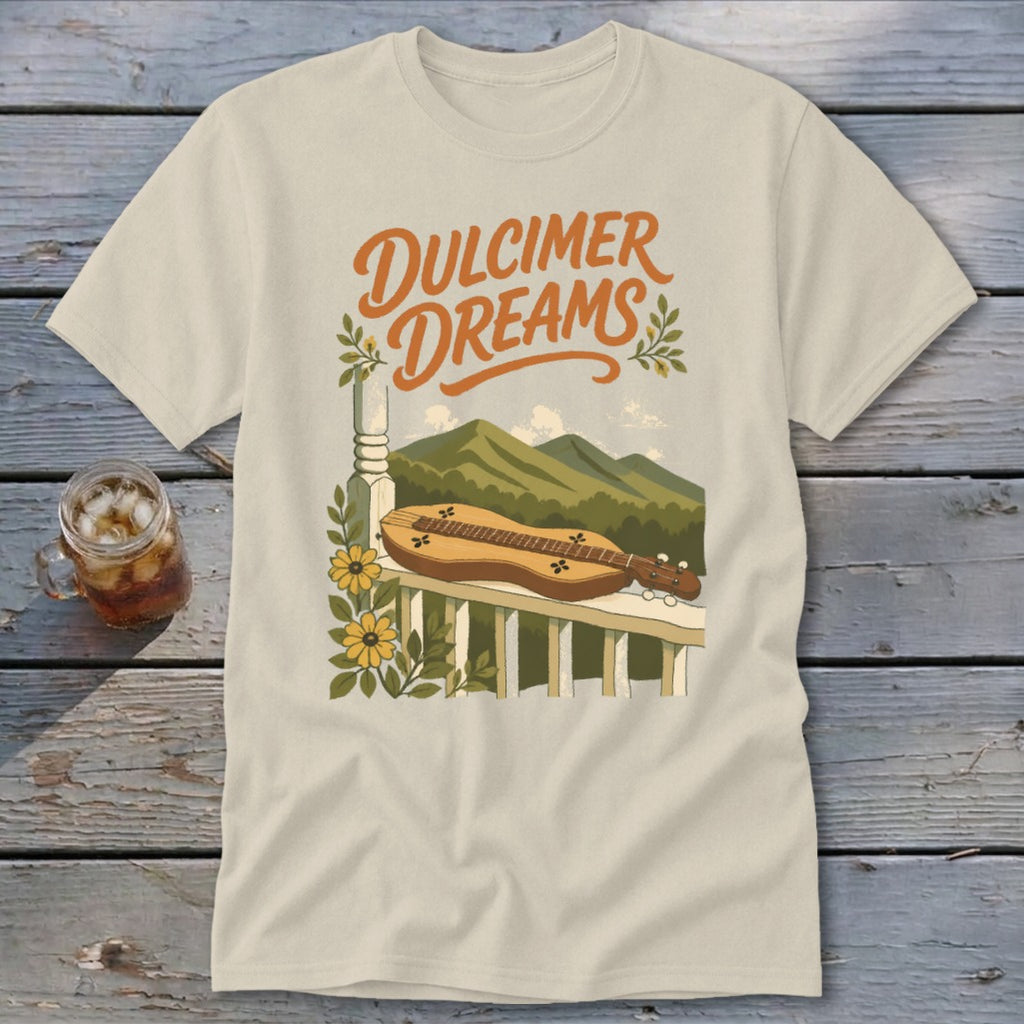 T-shirt with "Dulcimer Dreams" text and a dulcimer on a porch railing with mountains.