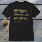 Black t-shirt with text listing "Things We Did:", "Things We Didn't Do:", etc.