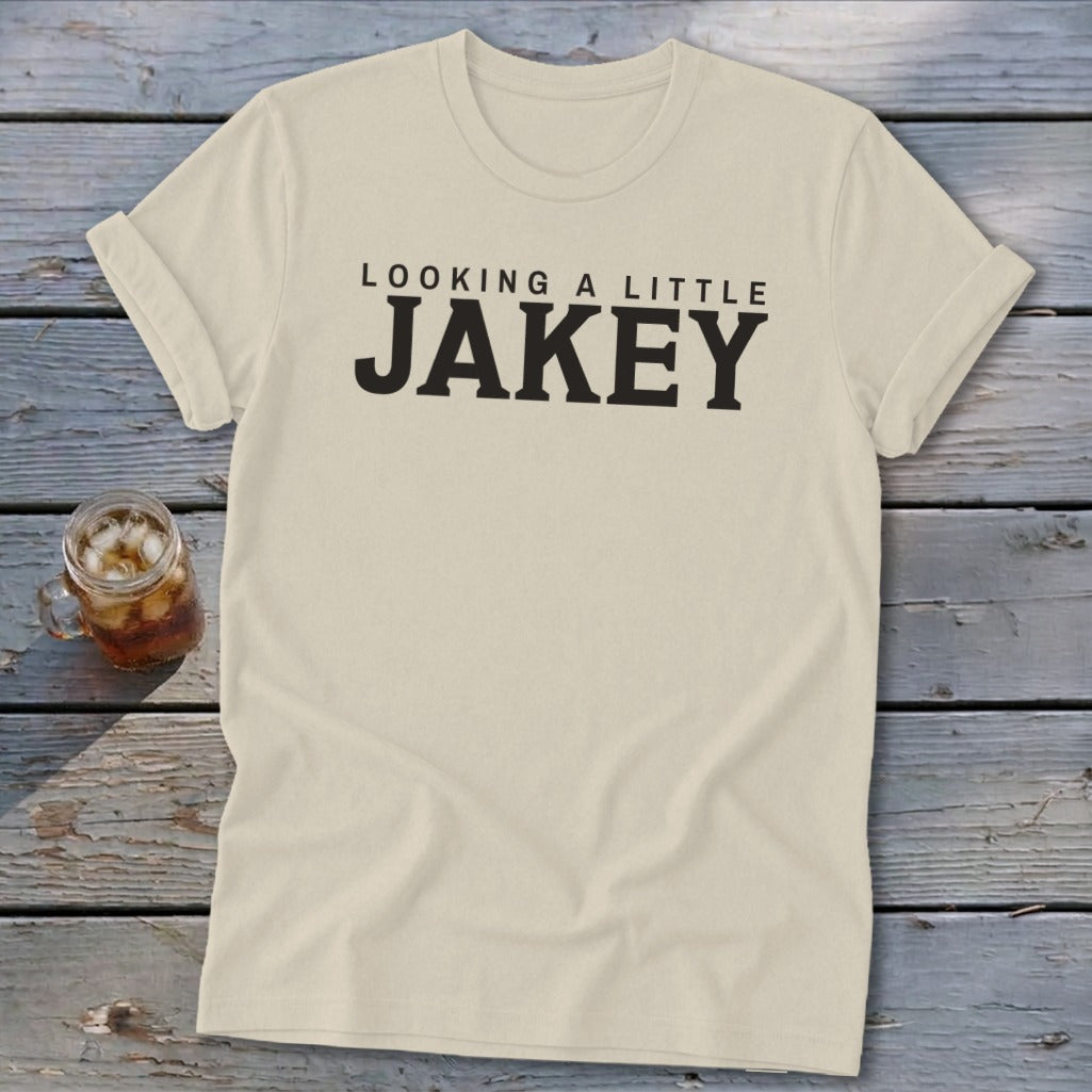 Cream t-shirt with "LOOKING A LITTLE JAKEY" text and a drink in a mason jar.