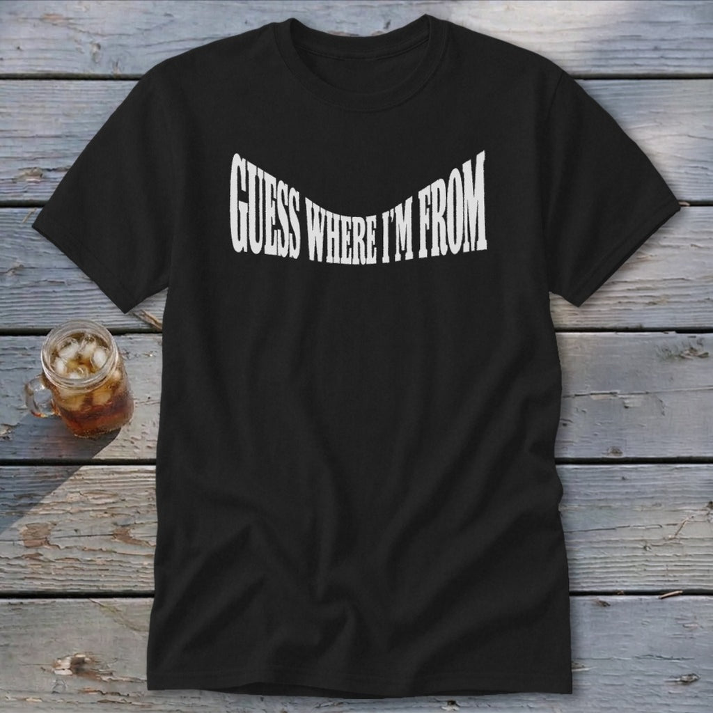 Black t-shirt with white text that reads "GUESS WHERE I'M FROM"