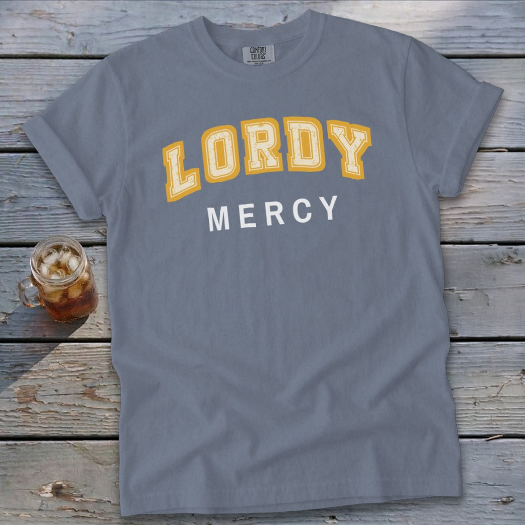 Grey t-shirt with "LORDY MERCY" text in yellow and white.