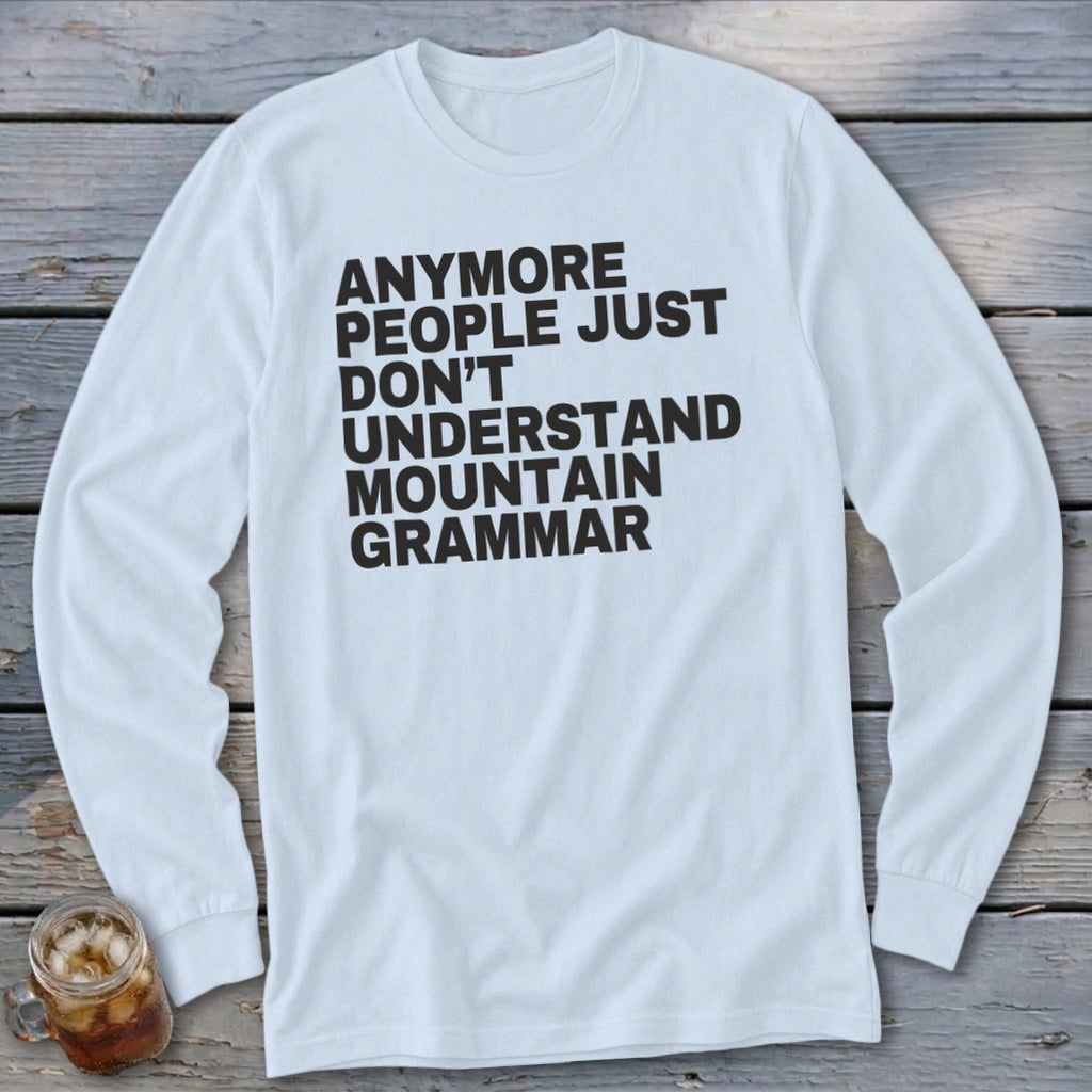 White long-sleeved shirt with black text reading "ANymore people just don't understand mountain grammar."