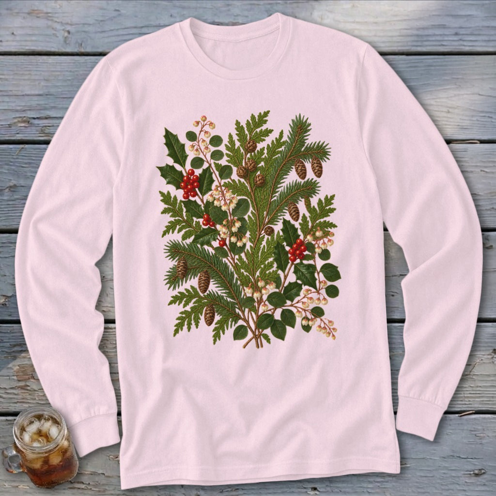 Pink long-sleeve t-shirt with a botanical print of pine, holly, and pinecones.