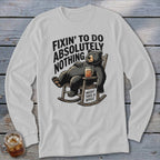 Light gray long-sleeve t-shirt with a graphic of a bear in a rocking chair holding a drink.
