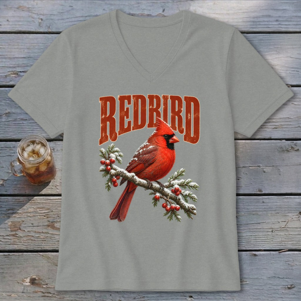A grey V-neck t-shirt featuring a graphic of a red cardinal on a snowy branch with red berries and the text Redbird above it.