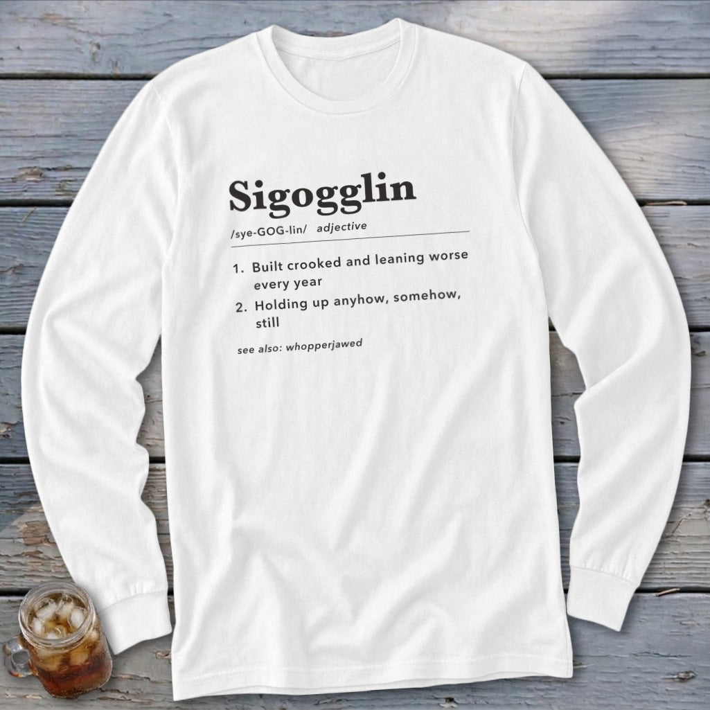 White long-sleeve shirt with "Sigogglin" definition printed in black.