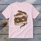 Pink t-shirt with a coiled snake graphic and banners reading "Respect The Mountains" and "Watch Your Step".