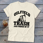 Cream t-shirt with black text and oil derrick graphic reading "Oilfield Trash and Proud of It".